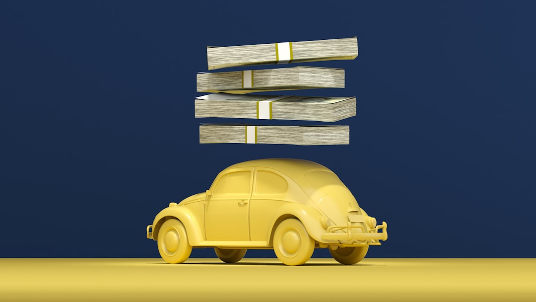 a-yellow-car-with-stacks-of-money-on-top-of-it-unfmwdamdzc